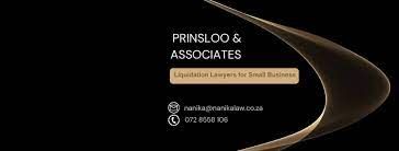 The business card of Prinsloo and Associates in Langebaan with black background with gold and white letters