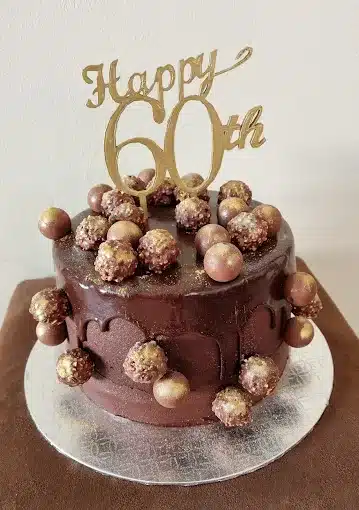 ^0 th birthday cake in dark chocolate by D-litefull Things in Langebaan.