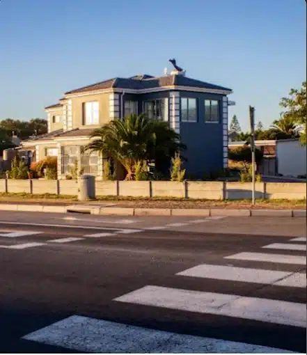 The grey double storey building that occupy the practise of Dr Marie Human as a GP in Langebaan.