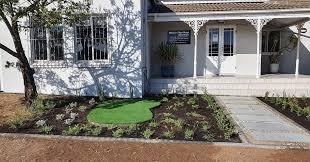 The office of Melanie von Hage attorneys in Langebaan, situated in Seeduiker street. This building has white exterior and landscaped garden to the entrance.