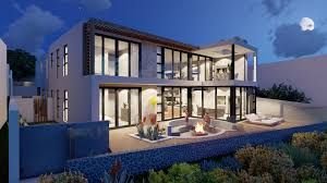 A House designed by Moffett and Moffett Architects in Langebaan with lots of glass windows, flat roof and firepit in front.