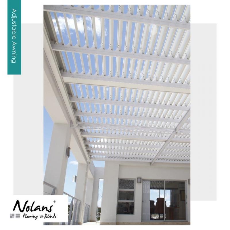 Nolans Flooring & Blinds Langebaan install this white shutters as ceiling on this white patio at a home in Langebaan