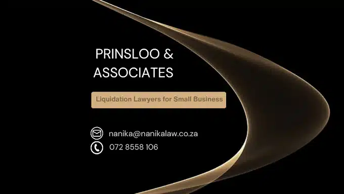 The business card of Prinsloo & Associates in Langebaan. Dark background with letters in white with gold graphics.