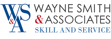 The logo of Wayne Smith and Associates in Langebaan with blue, black and red letters on a white background.