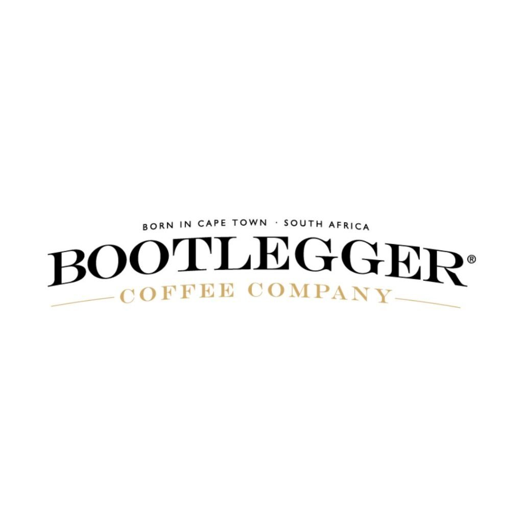 The logo of Bootlegger Coffee Shop in Langebaan on white background, black and gold letters.