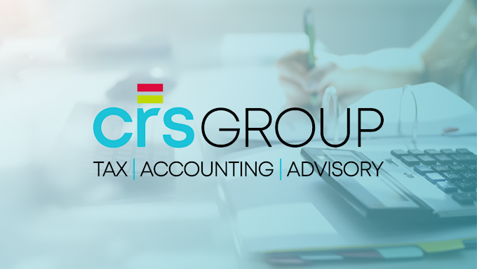 The logo of CRS Group in Langebaan with Branding in light blue and black letters and faded background of someone working at a desk.