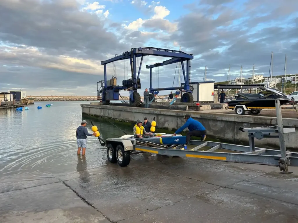 The launching facilities at the Marina at Club Mykonos being used by The Boatyard Langbeaan with a boat crane in the background.