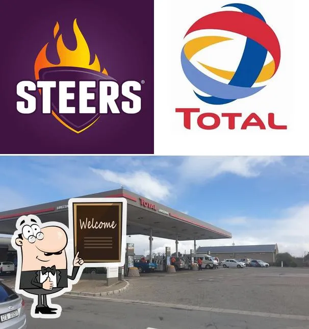 The TotalEnergies Petrol Station in Langbeaan with welcome sign , logo and logo of Steers that is on the premises.