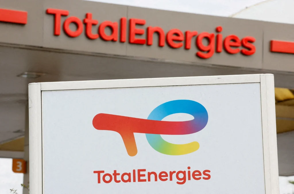 The logo of TotalEnergies in Langebaan with red signage on canopy and colourful brand logo on white background.